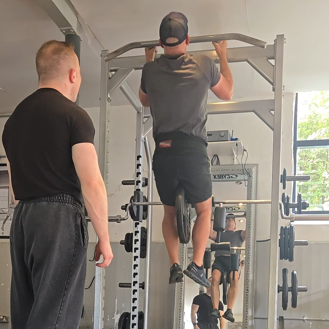 First weighted chin-up at 60. 25 kg added. The work made real.